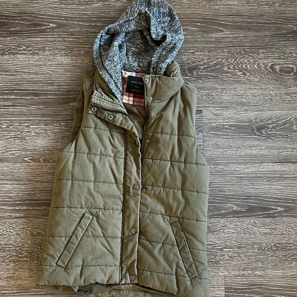 Green puffer vest with attached grey hood